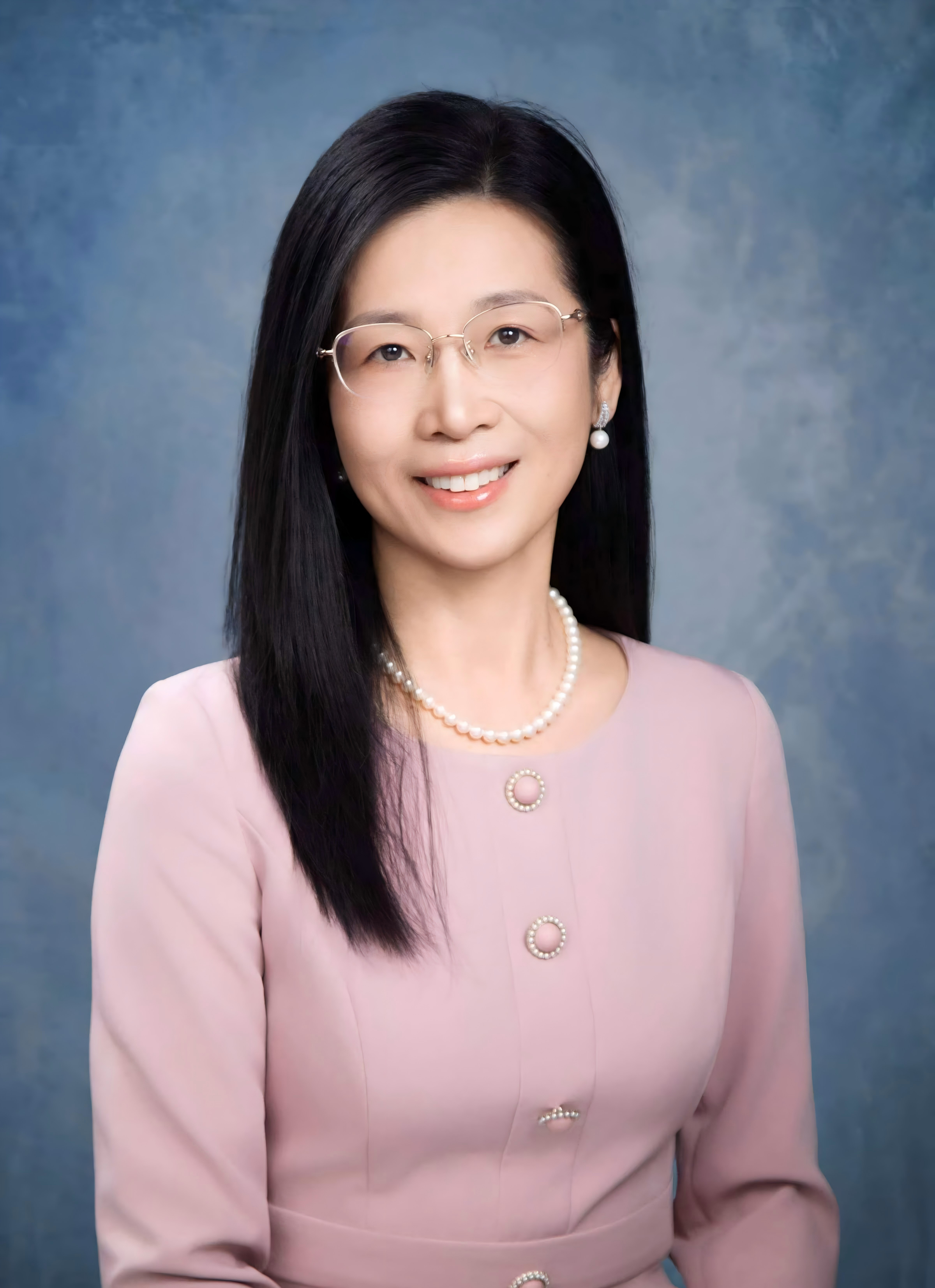 谢伟英 女士